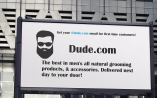Dude.com logo